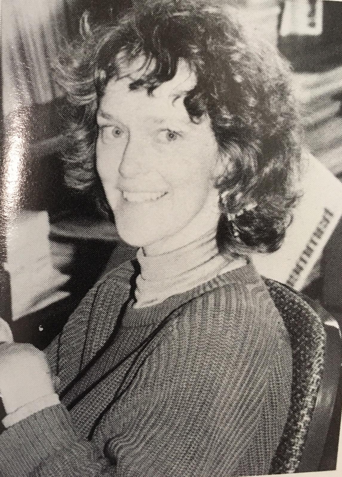 Headshot photo of Prof. Sandra Grayson at her desk